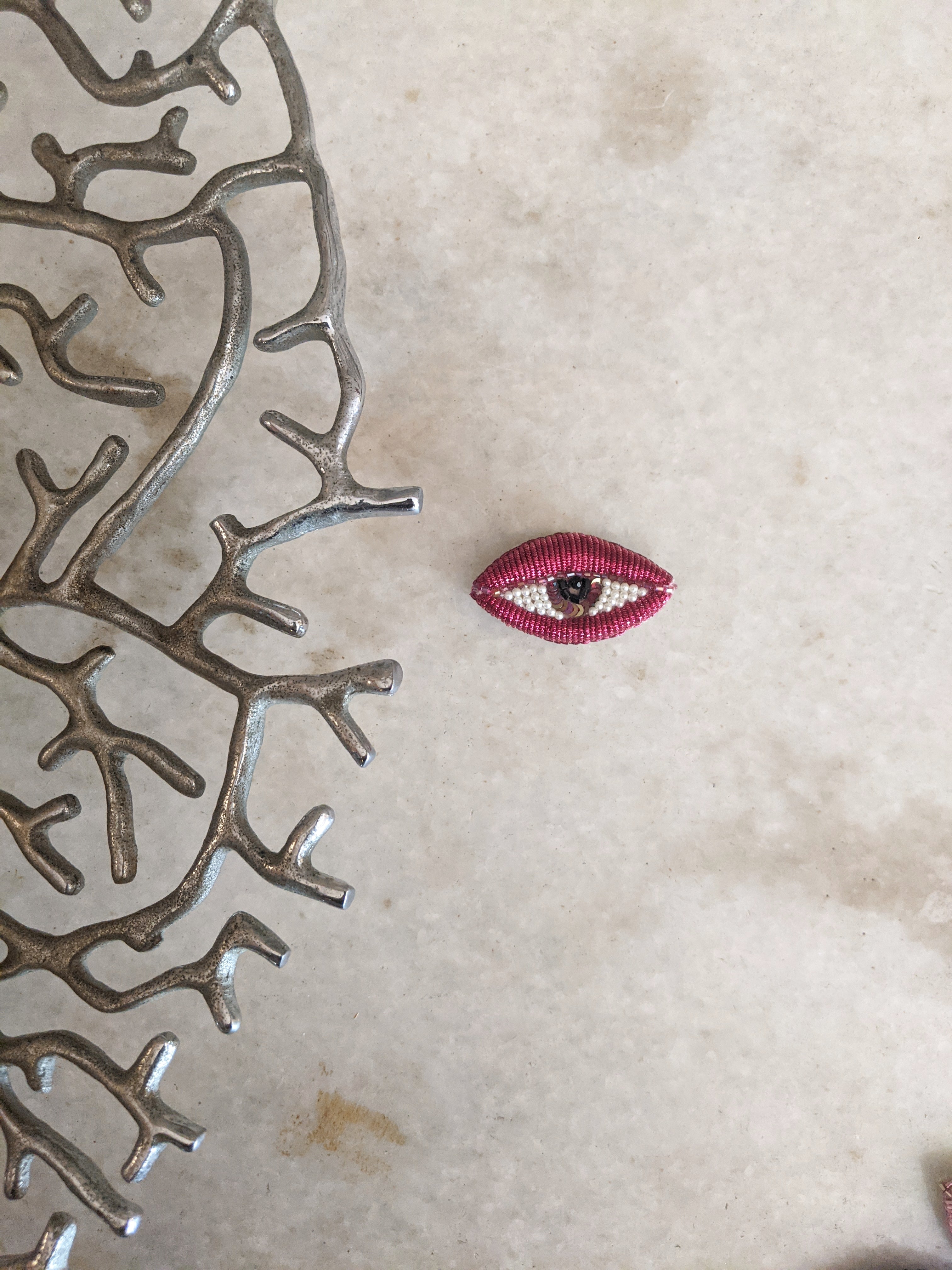 The DaLí Brooch in Ruby
